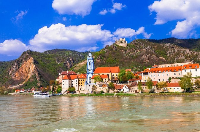 Dürnstein from the Danube, the blue baroque tower below the castle ruin